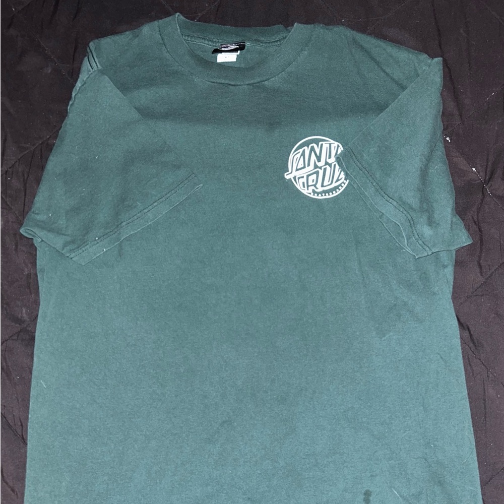 Worn, dark green Santa Cruz shirt